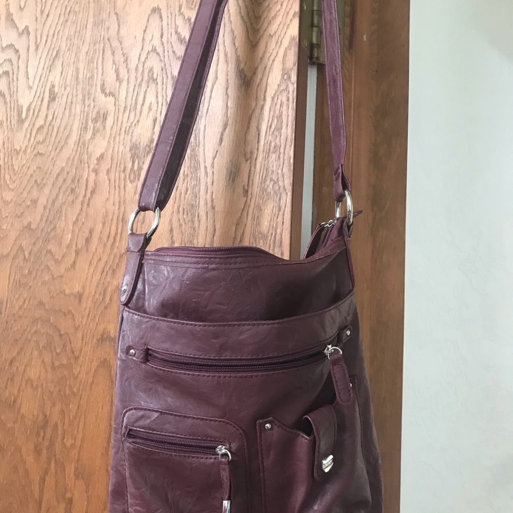 Rossetti purple handbag in good condition